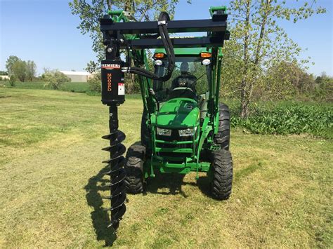 john deere skid steer post hole digger|loader mounted post hole digger.